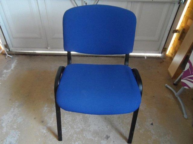 Preview of the first image of BLUE UPHOLSTERED STACKING CHAIR.