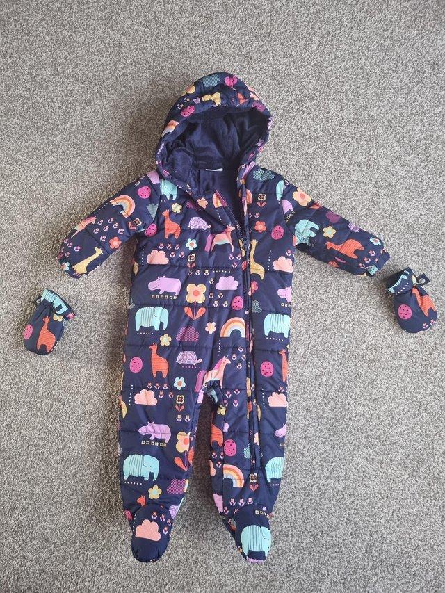 Preview of the first image of Next 9-12 month pram suit with detachable mittens.