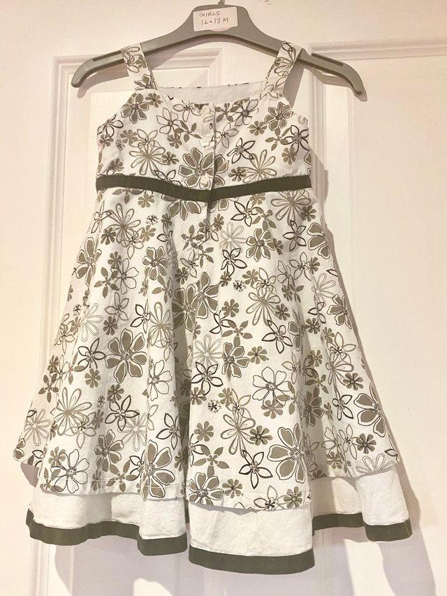 Preview of the first image of Girls Dress aged 12/18 months.