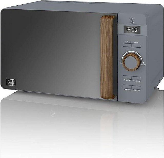 Preview of the first image of SWAN DIGITAL MICROWAVE-WOOD EFFECT HANDLE-20L-800W-NEW.