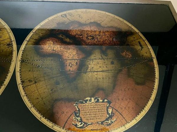 Image 2 of Coffee table with map on it