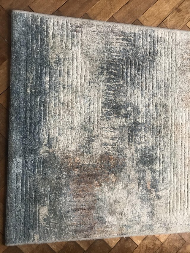 Preview of the first image of Rectangular rug for living/dining room.
