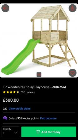 Image 1 of Wooden playhouse with slide