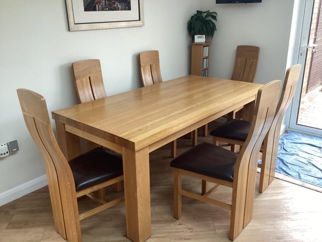 Preview of the first image of Oak Furniture table and 6 chairs.