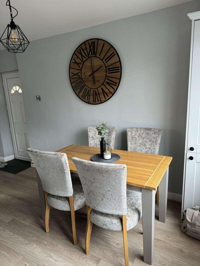 Preview of the first image of Oak Furnitureland 4 seater dining room table and chairs.