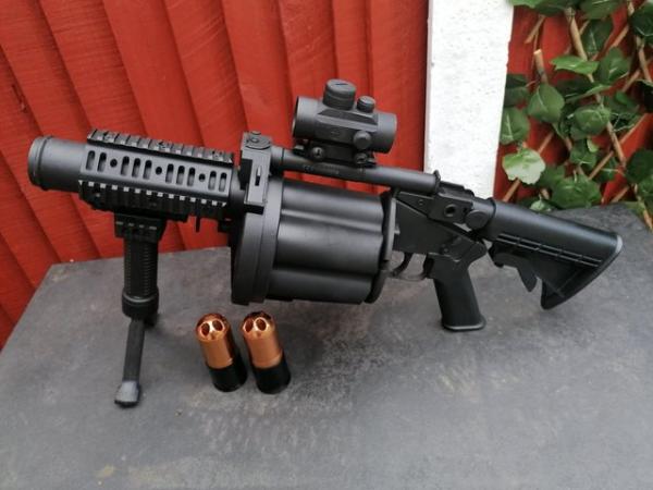 Image 1 of Paintball multi drum launcher for sale.