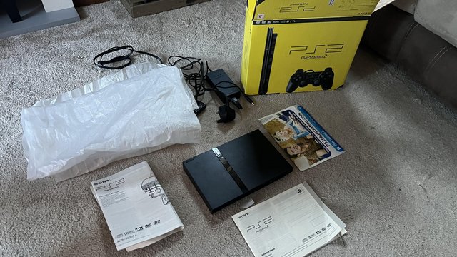 Preview of the first image of PlayStation 2 Slim - Boxed.