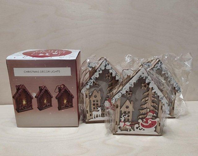 Preview of the first image of Set of 3 Hanging Christmas Wooden House with LED Warm Lights.