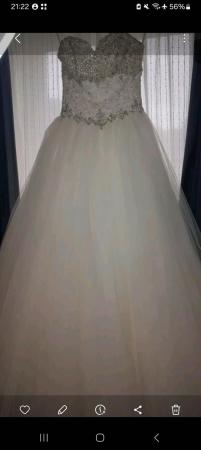 Image 2 of Designer wedding dress size S and Size M available
