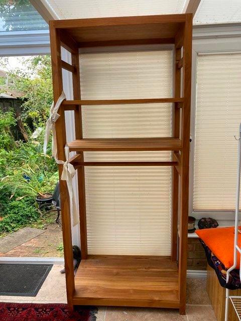 Preview of the first image of Solid teak shelves/hanging rail and solid chest.