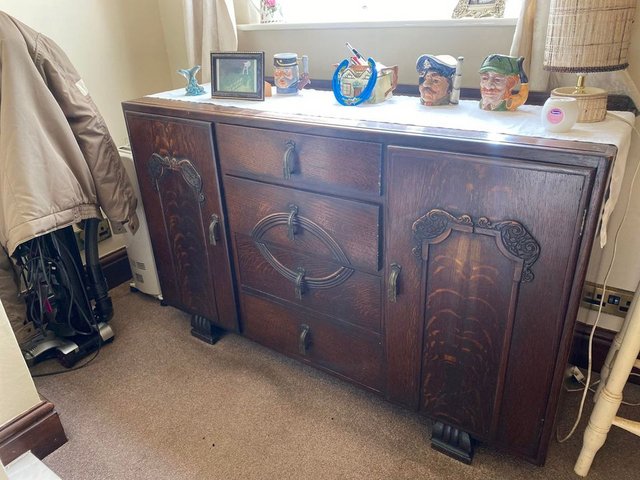 Preview of the first image of Vintage Carved Buffet Sideboard with carved feet..