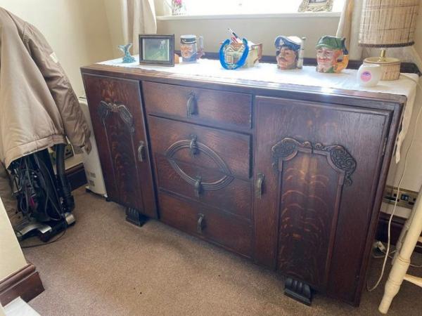 Image 1 of Vintage Carved Buffet Sideboard with carved feet.