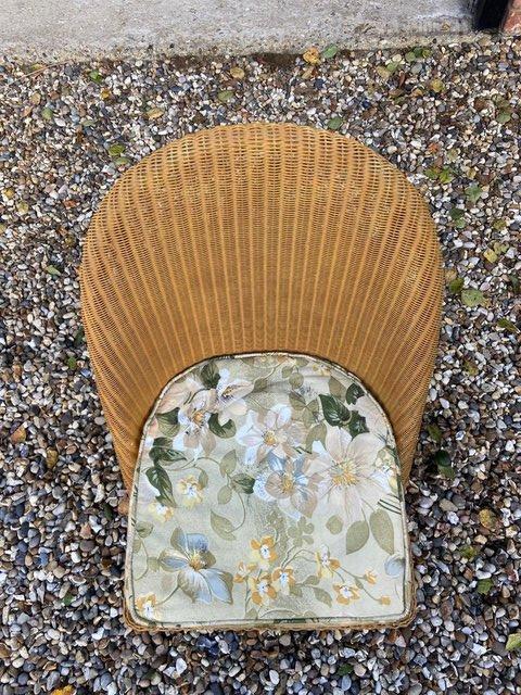 Preview of the first image of Lloyd Loom Lusty Chair c1950’s with upholstered seat.