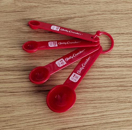 Preview of the first image of Set Of 4 Betty Crocker Vintage 1990's Red Measuring Spoons.