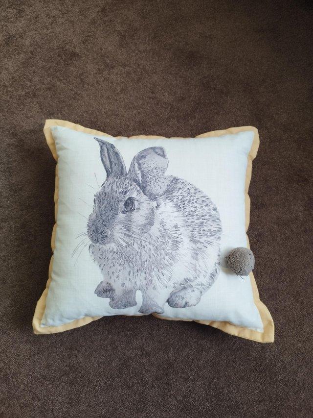 Preview of the first image of Rabbit Yellow Grey Cushion 35x35cm.