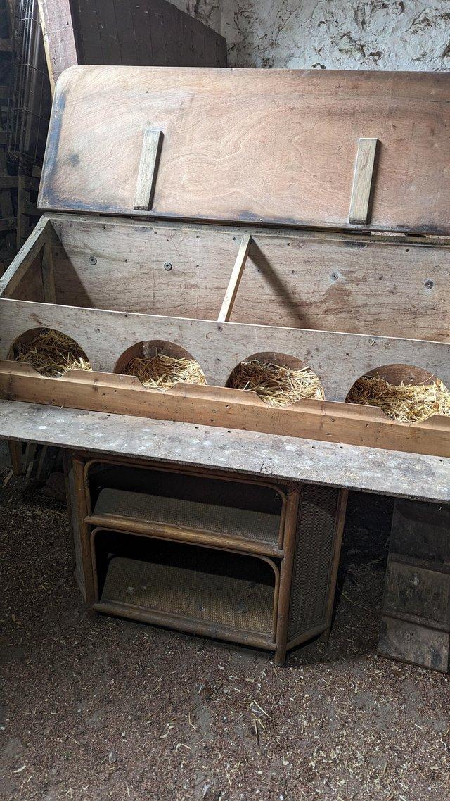 Preview of the first image of Solid hand made quality nesting box with hinged lid..