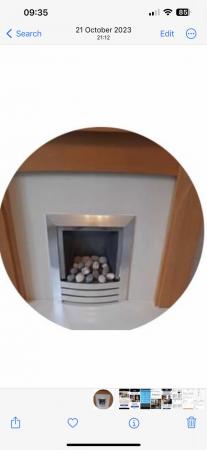 Image 1 of Oak fireplace and Kinder Camber pebble effect gas fire