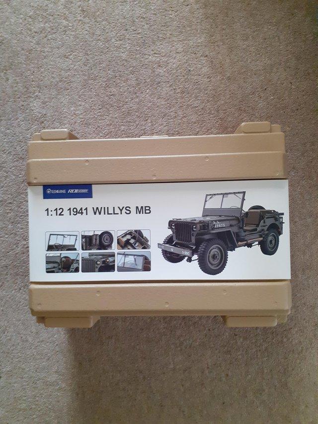 Preview of the first image of Eachine Roc hobby 1.12 Scale Radio Control WWII Jeep.