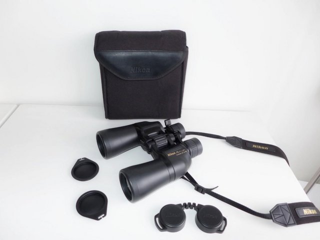 Preview of the first image of Nikon Action 10-22 x 50 ZOOM binoculars with case and caps.