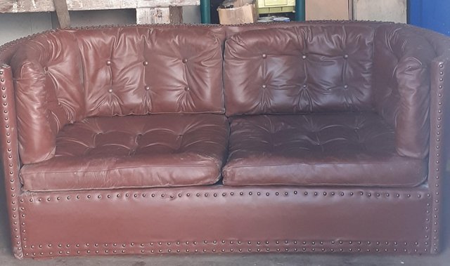 Image 1 of Leather 2 seater sofa with studwork