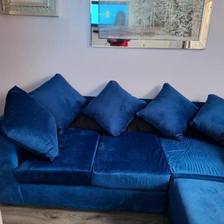 Image 1 of Brand new blue velvet corner sofa. Now reduced in price