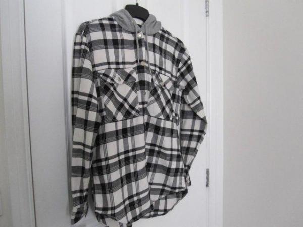 Image 1 of Black and white hoodie shirt from H+M
