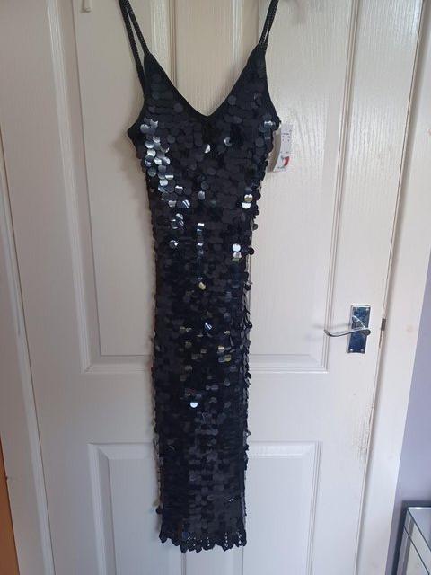 Preview of the first image of NEW BLACK SEQUIN PARTY DRESS 1990's with TAGS, Size 10.