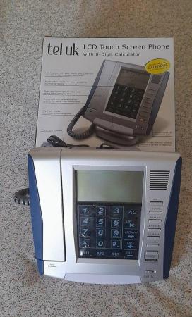 Image 1 of LCD Touch Screen Phone with 8 digit calculator