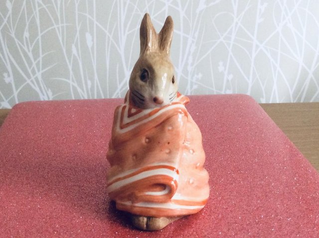 Preview of the first image of Beatrix Potter’s Poorly Peter Rabbit Figure.
