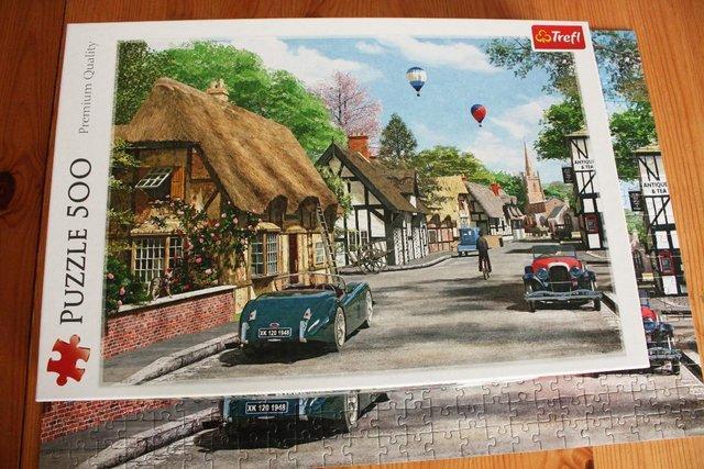 Preview of the first image of Trefl 500pc Jigsaw puzzle Street Cottage Lane,can be posted.