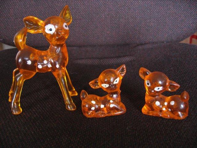 Preview of the first image of Vintage Orange Plastic Deer Family, Doe and 2 Baby Fawns Orn.