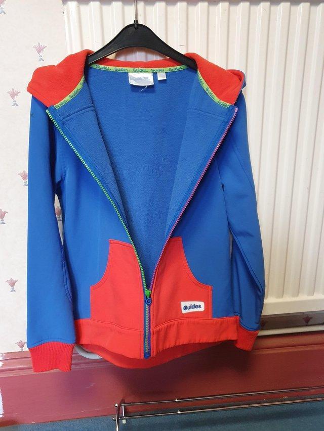 Preview of the first image of Girl Guide blue and red hoodie..
