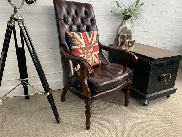 Preview of the first image of Oxblood vintage  chesterfield library armchair. Can deliver..