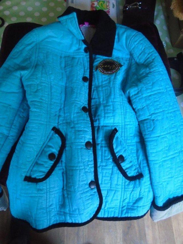 Preview of the first image of coat pineapple blue age 7-8 children’s.