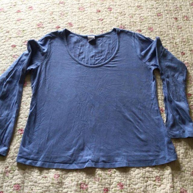 Preview of the first image of MODA MOTHERCARE Deep Sky Blue Stretchy Cotton Top, size 18.