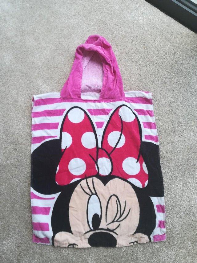 Preview of the first image of Child's hooded Minnie Mouse beach towel (& Spider Man).