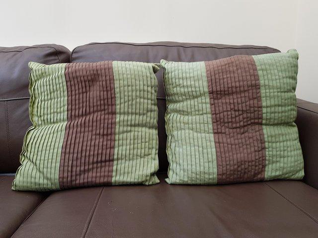 Preview of the first image of Two cushions Green with Brown strip.