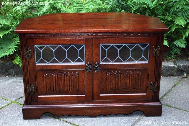 Preview of the first image of OLD CHARM TUDOR OAK CORNER TV DVD CABINET MEDIA STAND UNIT.
