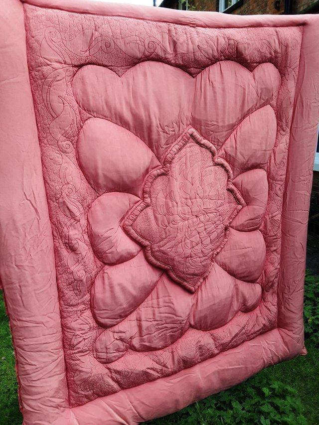 Preview of the first image of Vintage feather eiderdown in rose satin.