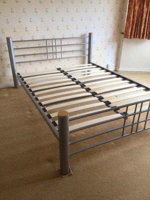 Preview of the first image of DOUBLE BED FRAME WITH WOODEN BASE.
