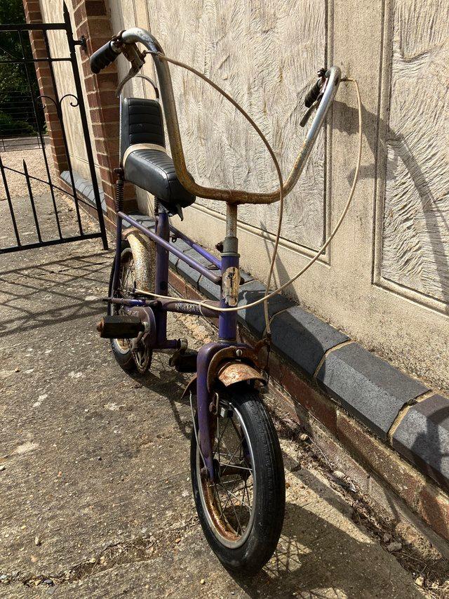 Preview of the first image of Purple 1970’s Rayleigh Tomahawk bicycle.