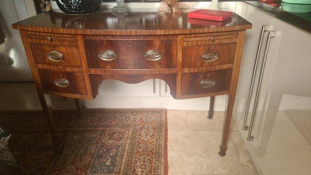 Preview of the first image of Antique Georgian Mahogany Desk/Sideboard with 5 Drawers.