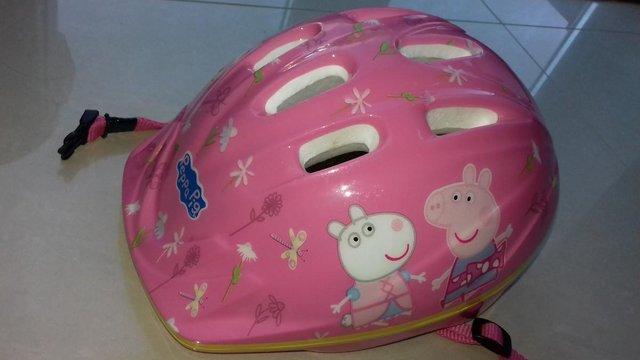 Preview of the first image of KIDS PEPPA PIG BIKE HELMET (Small).