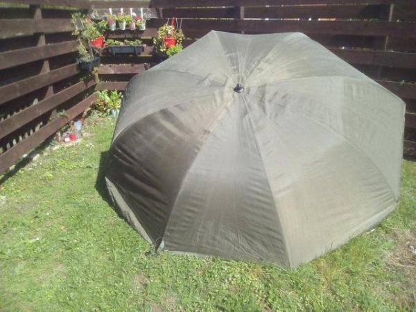 Image 1 of used storm brolly with poles   £20.00 or make an offer