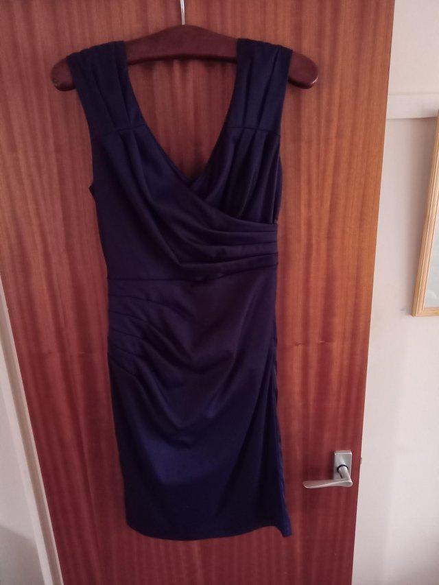 Preview of the first image of Phase eight purple evening dress.