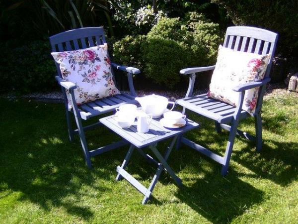 Image 1 of Set of wooden 2 garden carver chairs with cushions and side