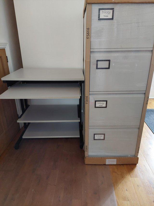 Preview of the first image of NEW LIGHT GREY 4 DRAW METAL FILING CABINET.