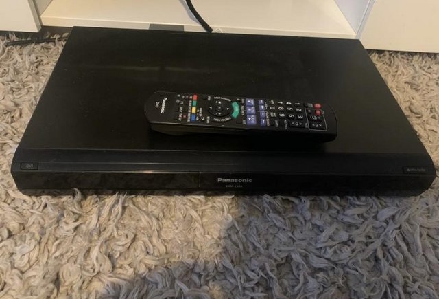 Preview of the first image of panasonic viera dvd player with remote.