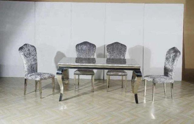 Preview of the first image of Louis marble dining table with 4 Alice silver velvet chairs.
