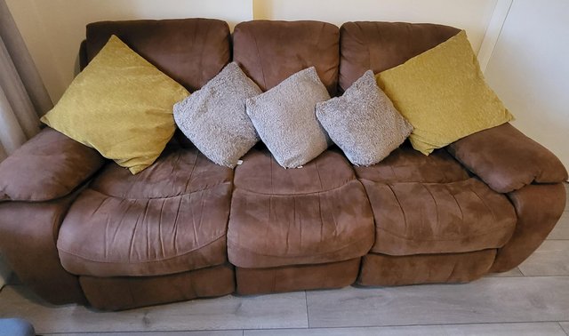 Preview of the first image of Brown suede sofa very good clean condition.